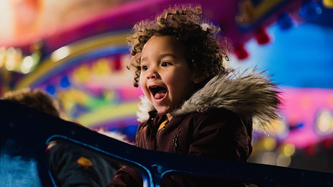Cash for kids - picture of a child enjoying herself