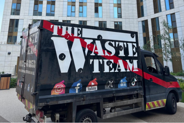 The Waste Team van parked outside flats
